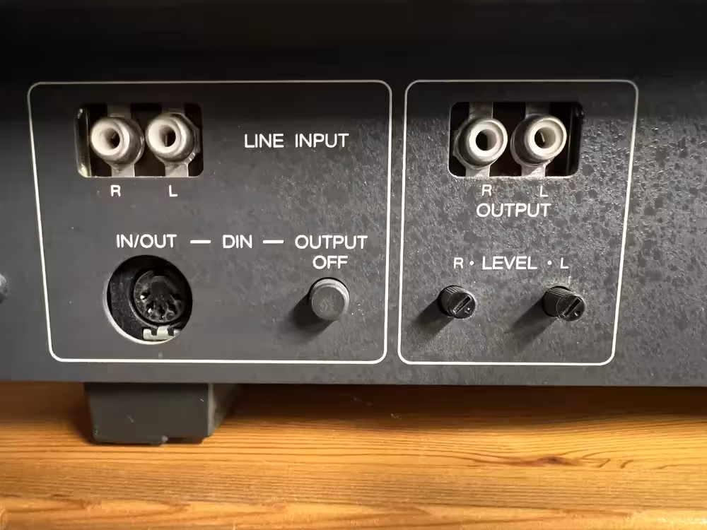 RCA output connectors on the back of a cassette deck